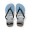 Flip-flops with a beach scene featuring waves and two people.