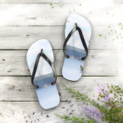 White flip-flops with a scenic lake and forest landscape print.