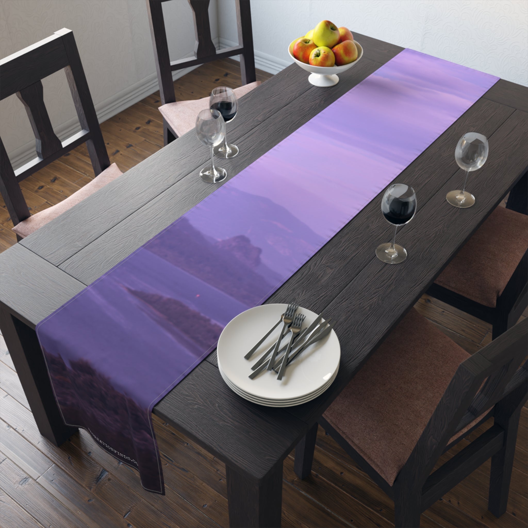 Purple abstract landscape table runner on dining table.