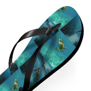 Flip-flops with repeating sea turtle pattern on blue ocean background.