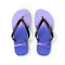 Purple flip-flops with a seascape scene of waves and rocks.
