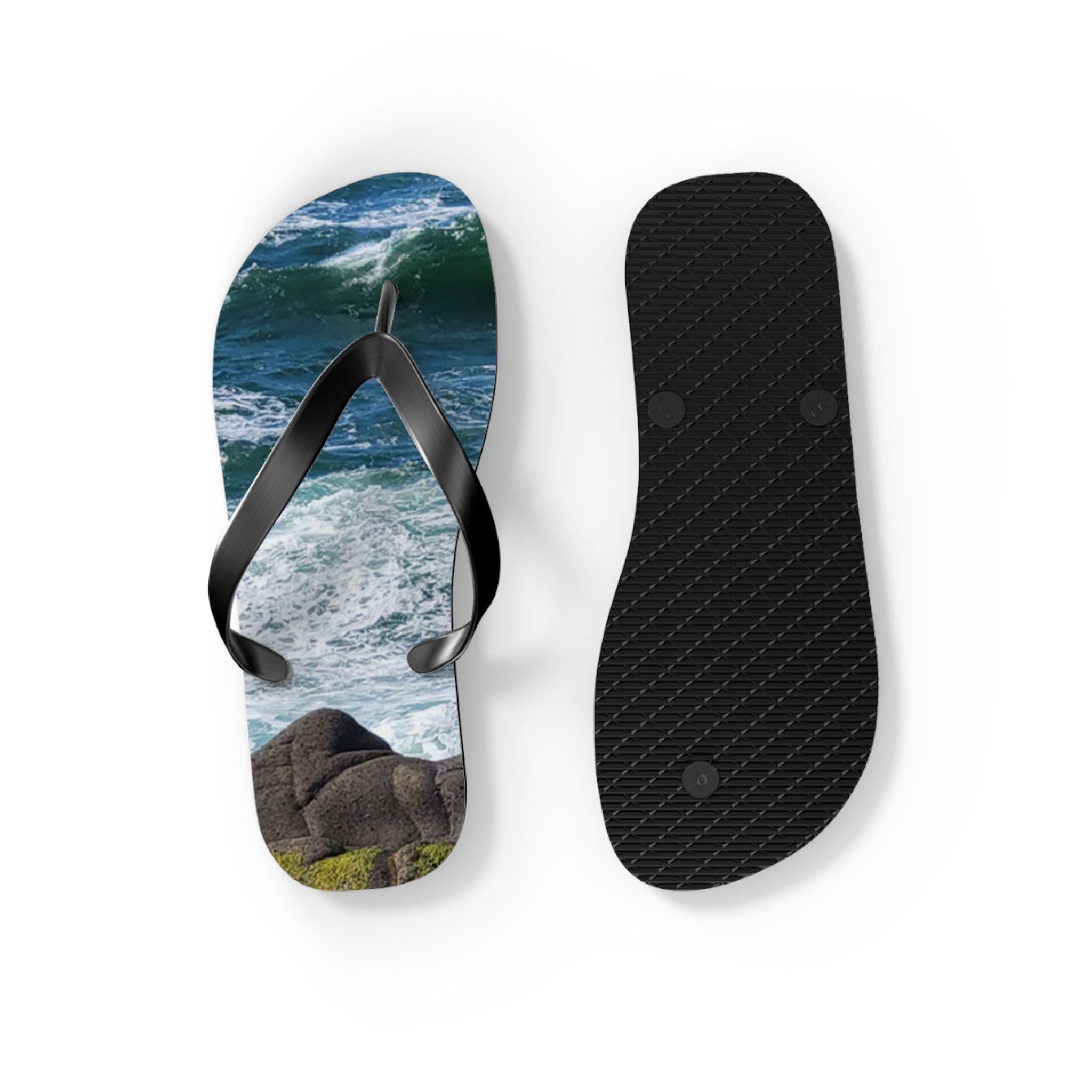 Flip-flops with ocean waves and rocks pattern on the sole.