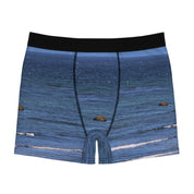 Boxer briefs with a wave and ocean rock print.
