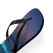 Black flip-flop with a starry night and ocean wave design.