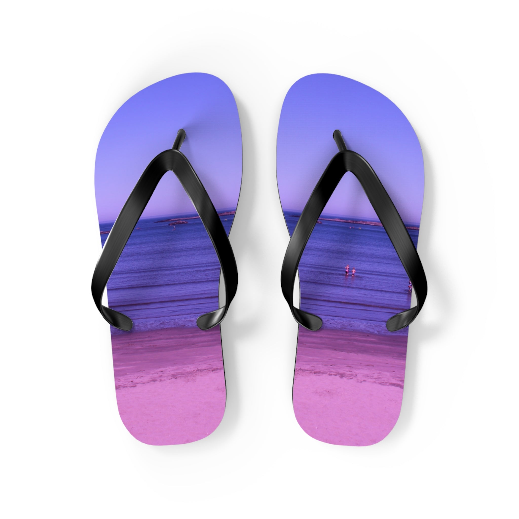 Purple flip-flops with a beach scene featuring a calm ocean and distant people.
