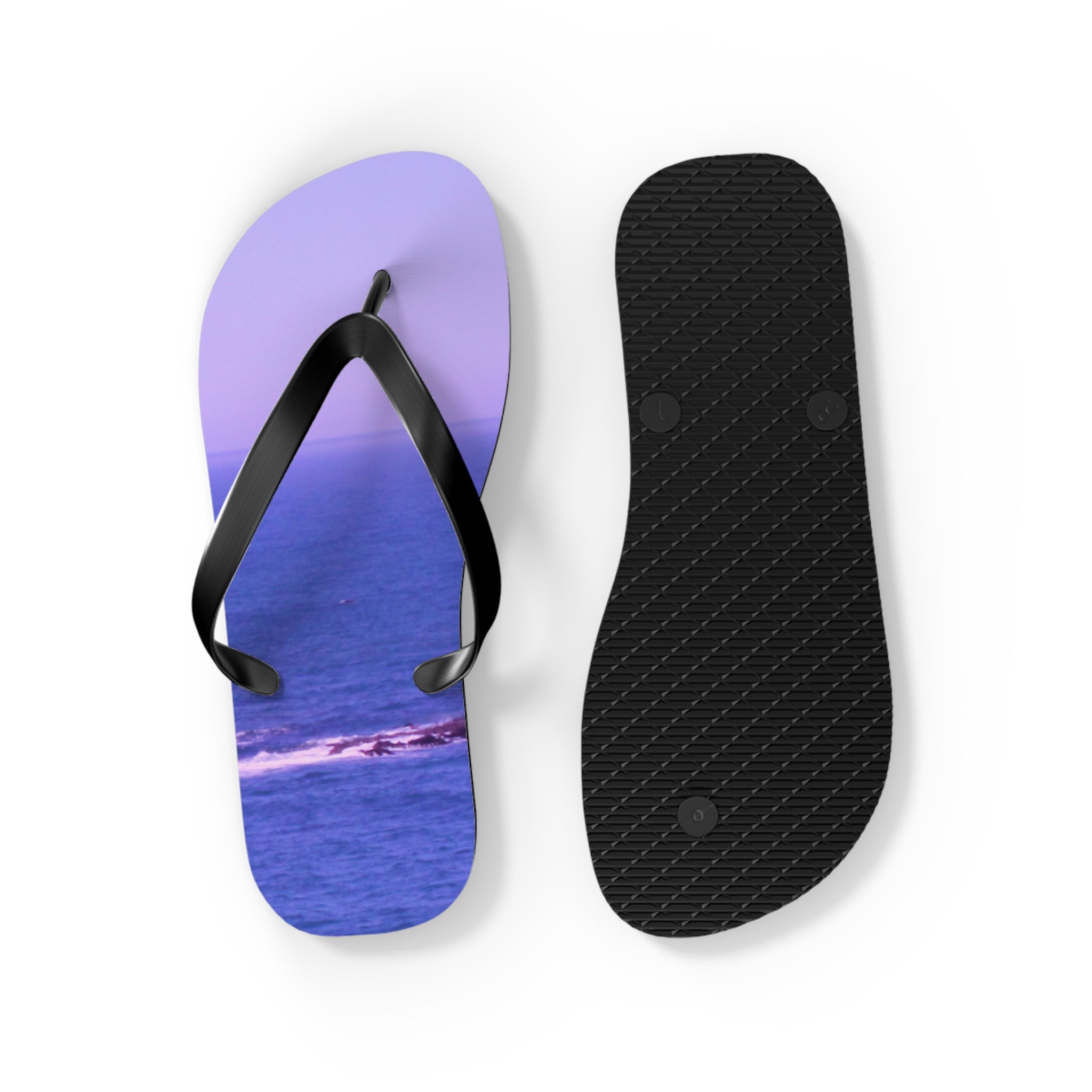Purple and blue ocean scene flip-flops, left and right view.