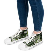 White high-top sneakers with a floral and bee print.