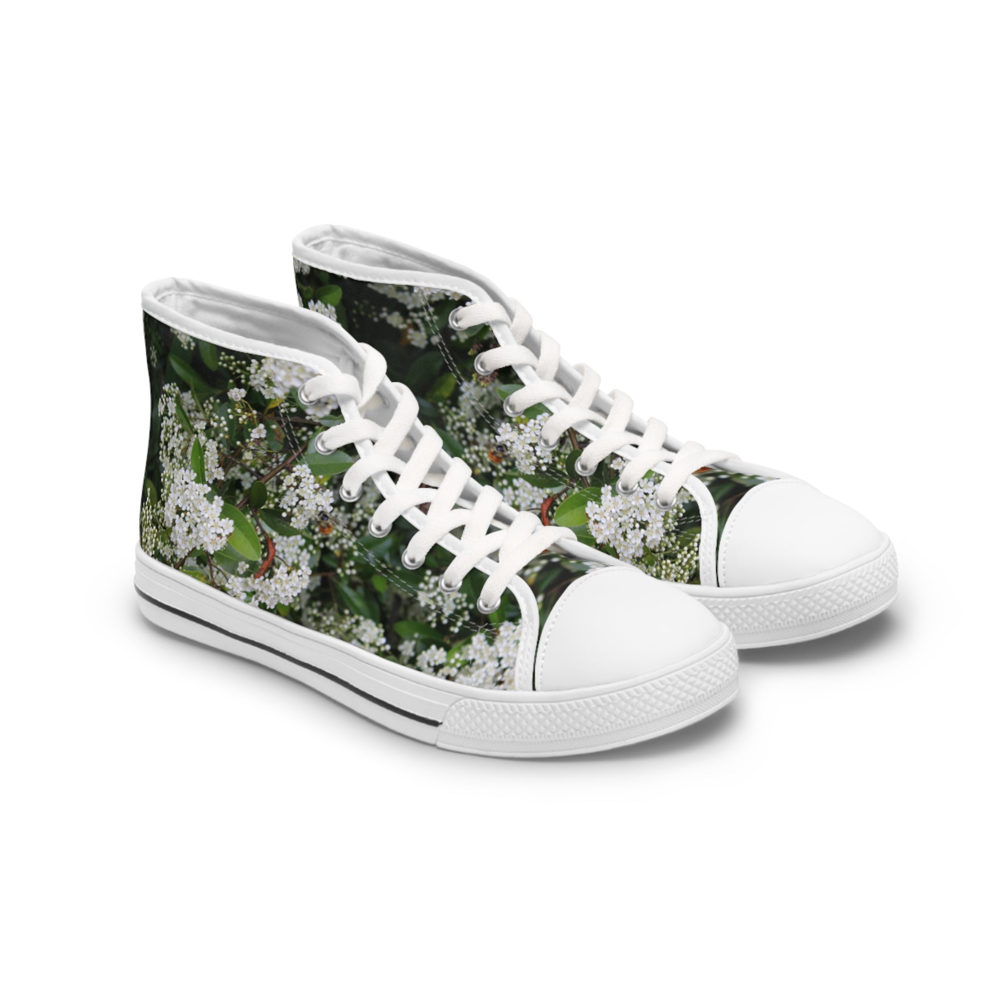 White high-top sneakers with a floral print and white laces.