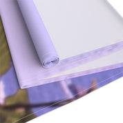 Rolled tapestry with blurred background of natural scenery.