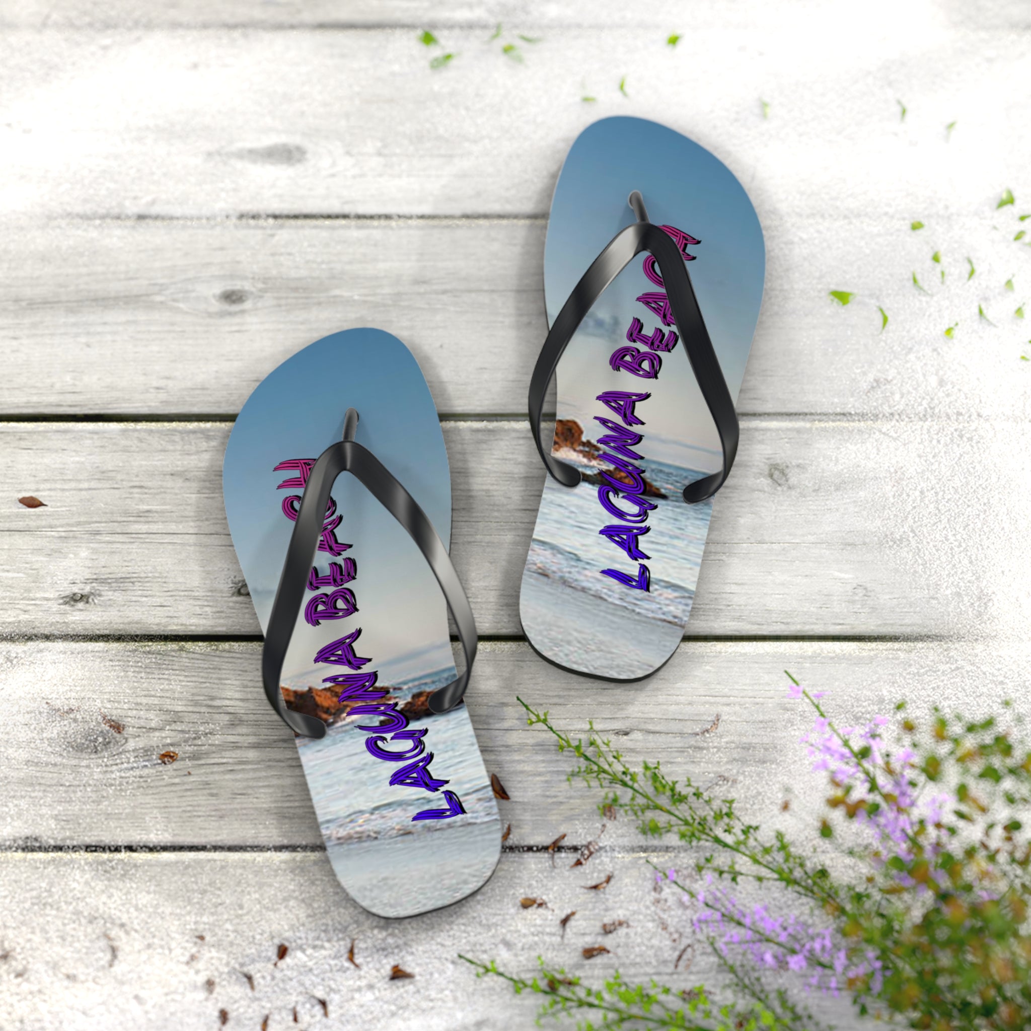 Flip-flops with "LAGUNA BEACH" text and ocean sunset scene.