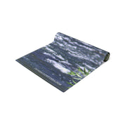 Rolled up blue and white striped beach towel with watermark "JKCREATONFINDS.COM".