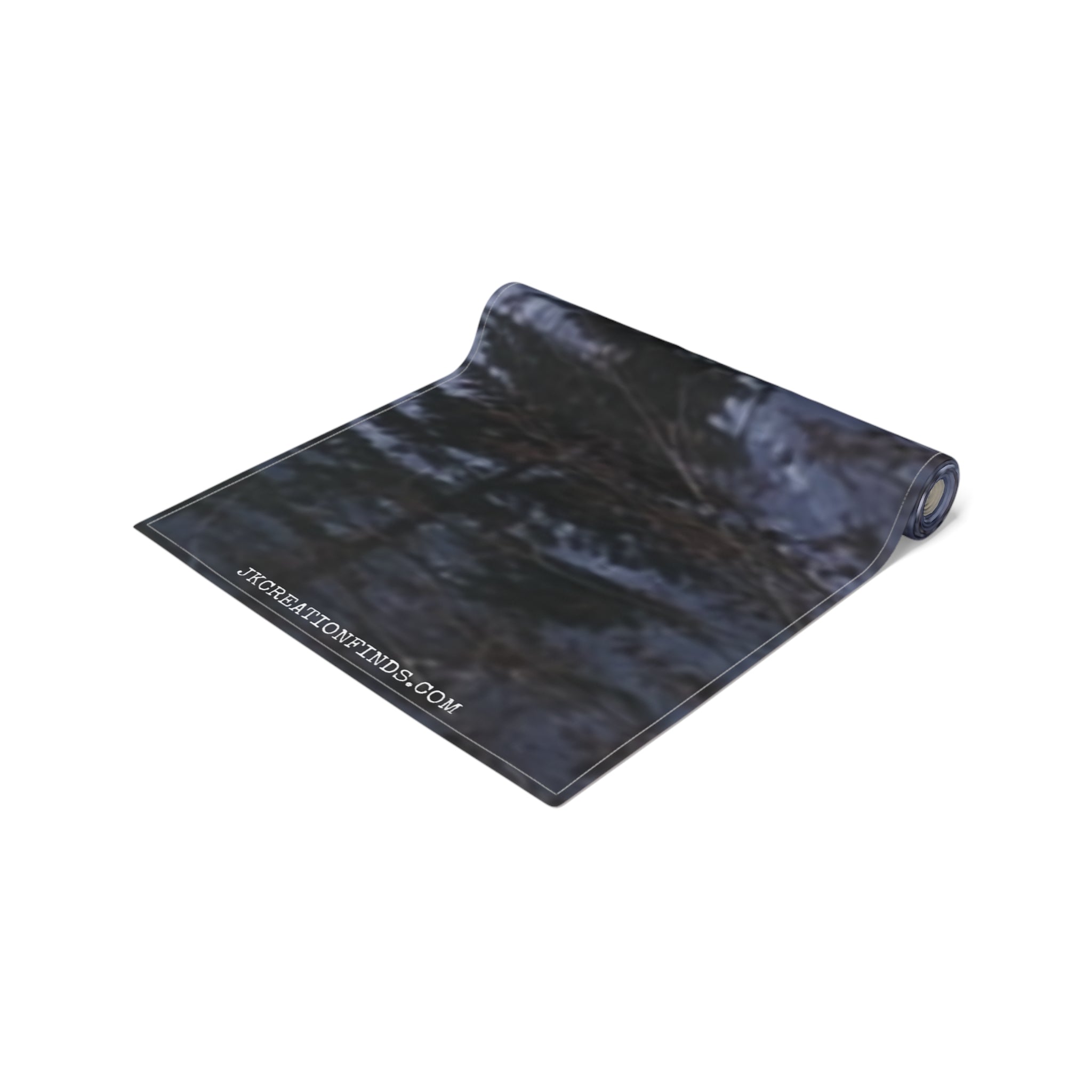 Dark, textured fabric unrolled, with text JKCREATIONFINDS.COM visible.