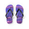 Flip flops with a purple rocky beach scene on the soles.