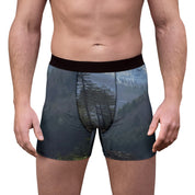 Men's boxer briefs with a forest and mountain landscape print.
