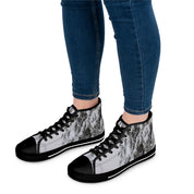 High-top sneakers with a black toe cap and white and gray abstract pattern.