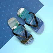 Flip-flops with ocean waves and palm trees on a blue and white background.