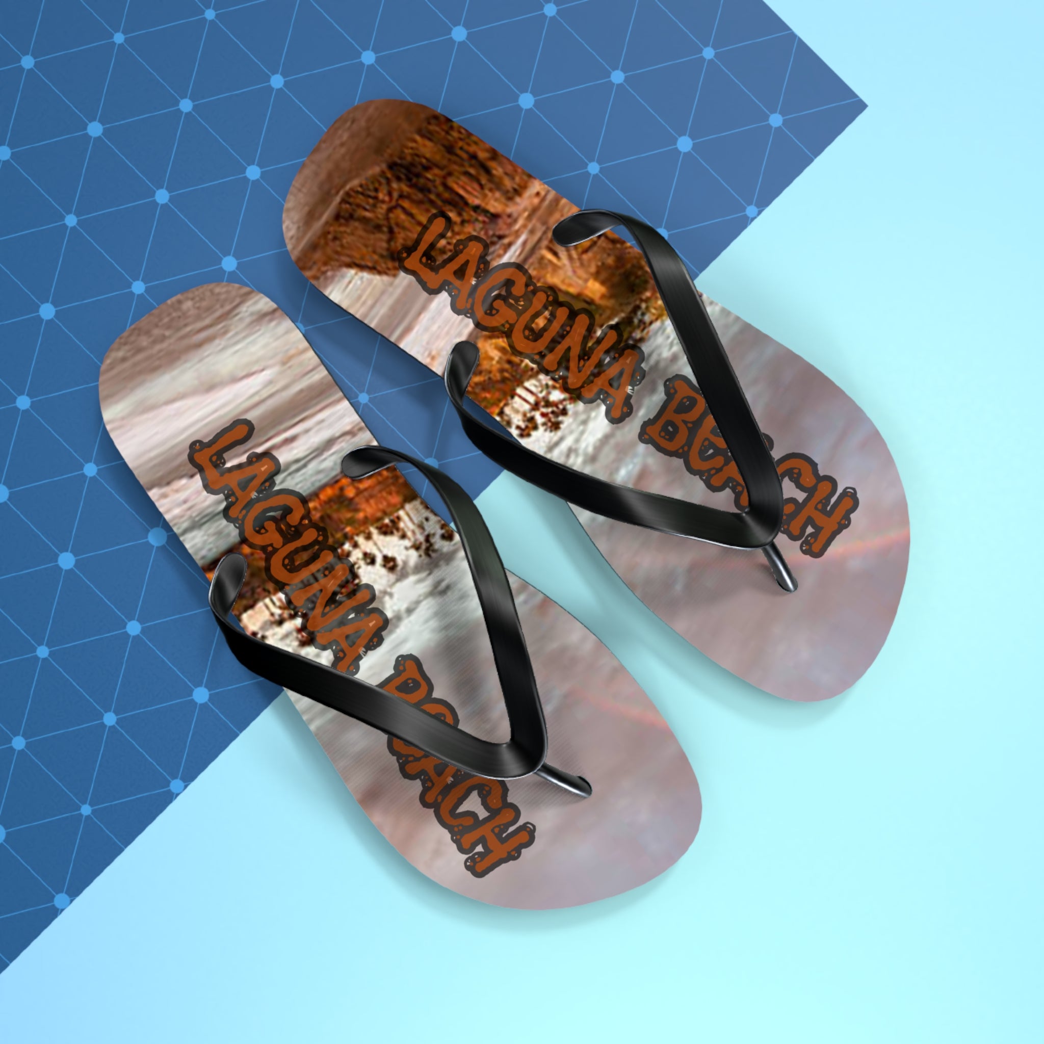Laguna Beach flip-flops with a brown, textured sole and black straps.