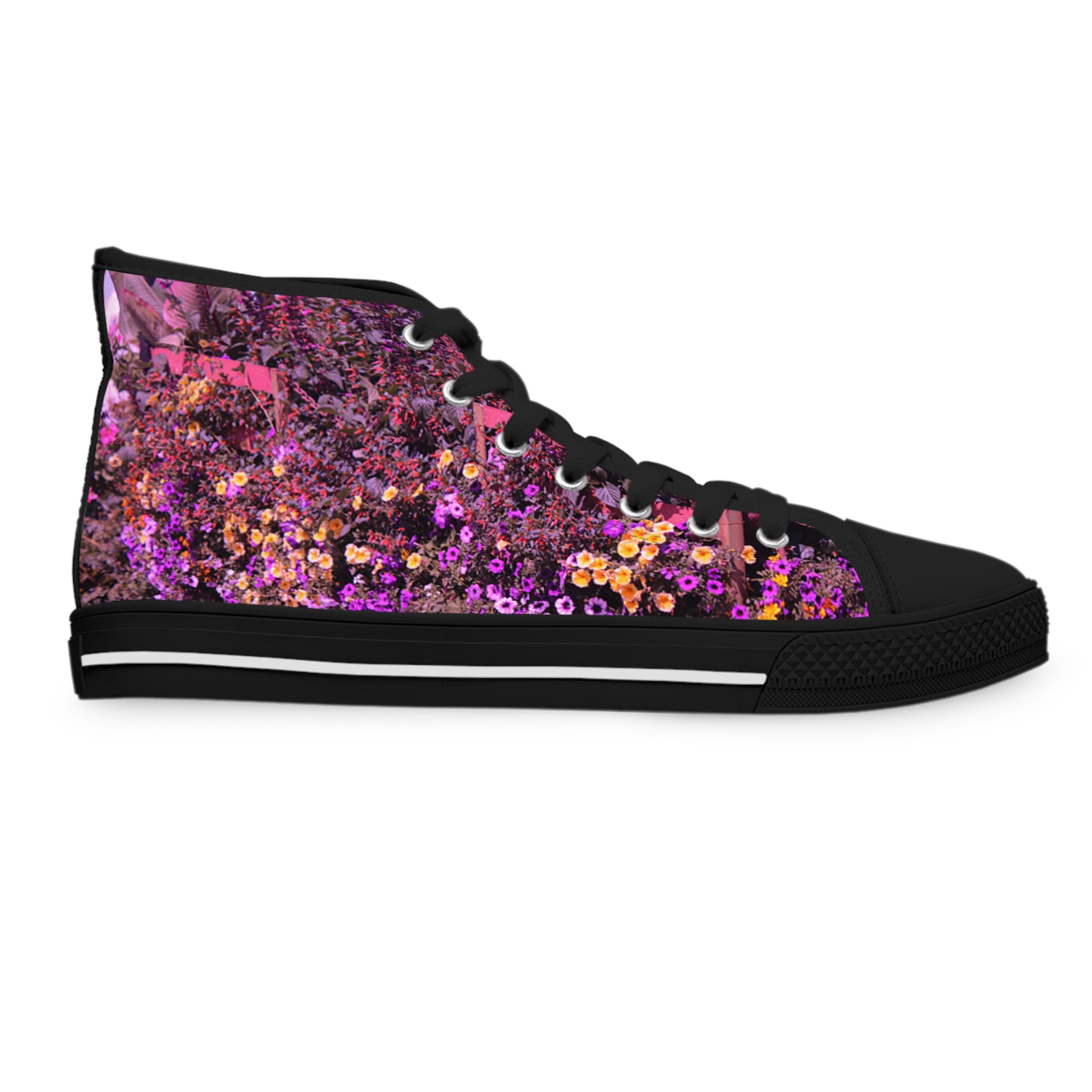 Black high-top sneaker with a colorful floral pattern.