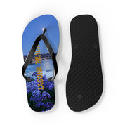 Flip-flops with a night sky and purple flowers, featuring text.
