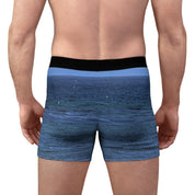 Men's boxer briefs with a blue ocean wave pattern.