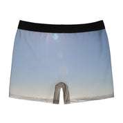 Boxer briefs with a beach sunset scene and a wooden pier.