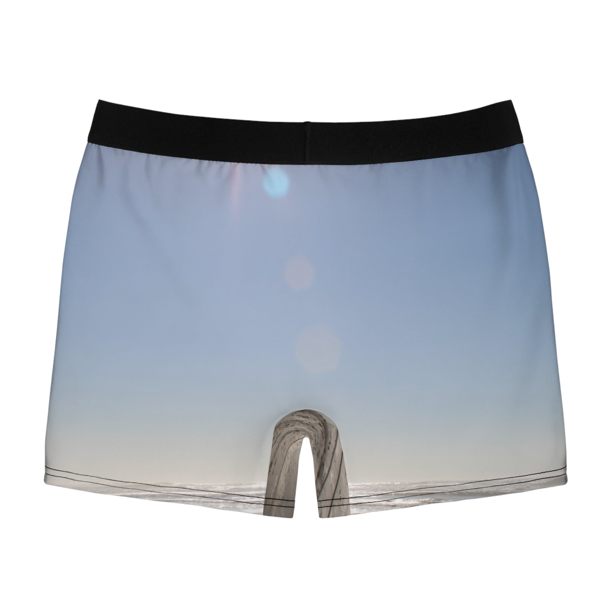 Boxer briefs with a beach sunset scene and a wooden pier.
