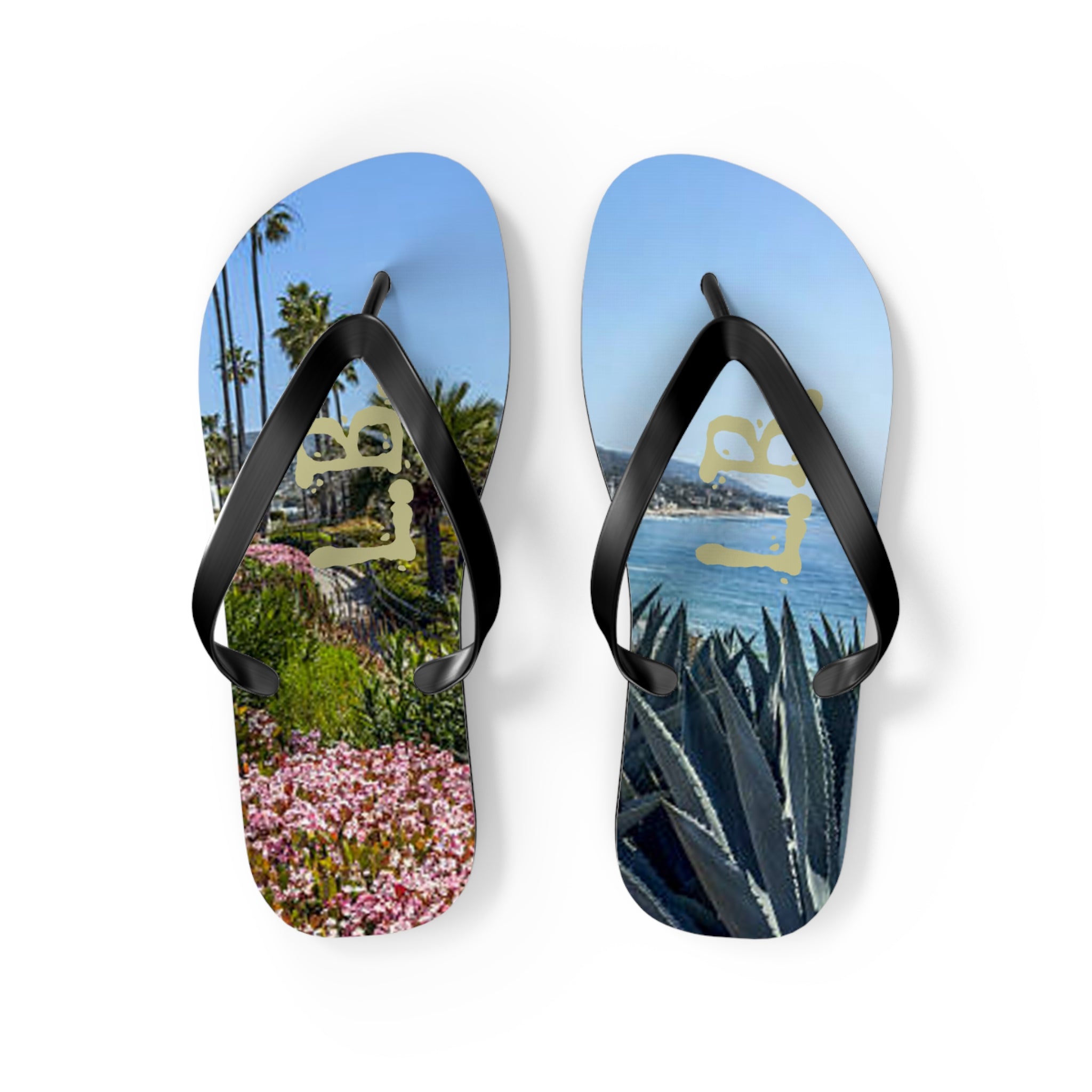 Flip-flops featuring a coastal landscape with flowers and "LB" text.