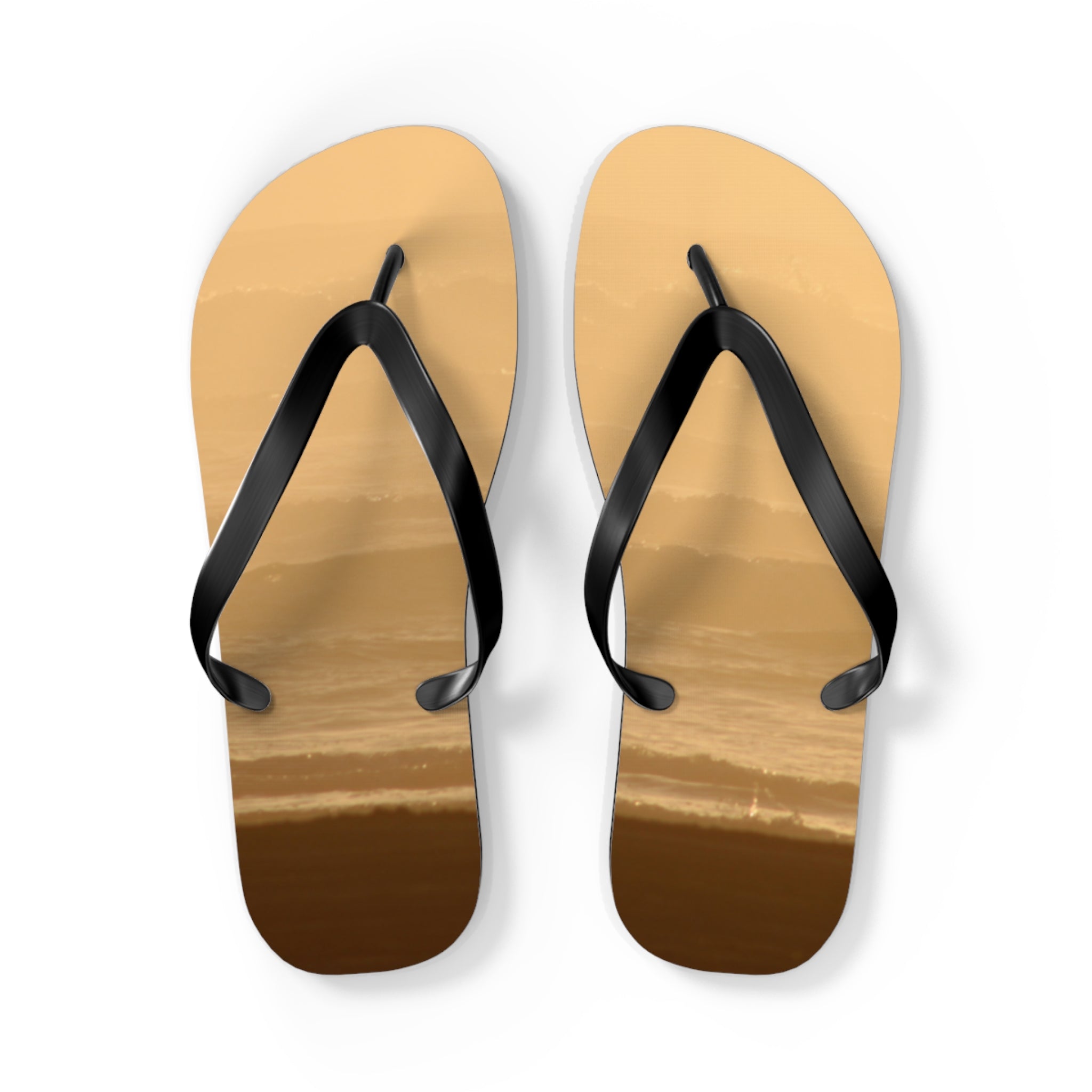 Brown flip-flops with black straps featuring a beach wave pattern.