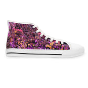 White high-top sneaker with a floral pattern of pink and yellow flowers.