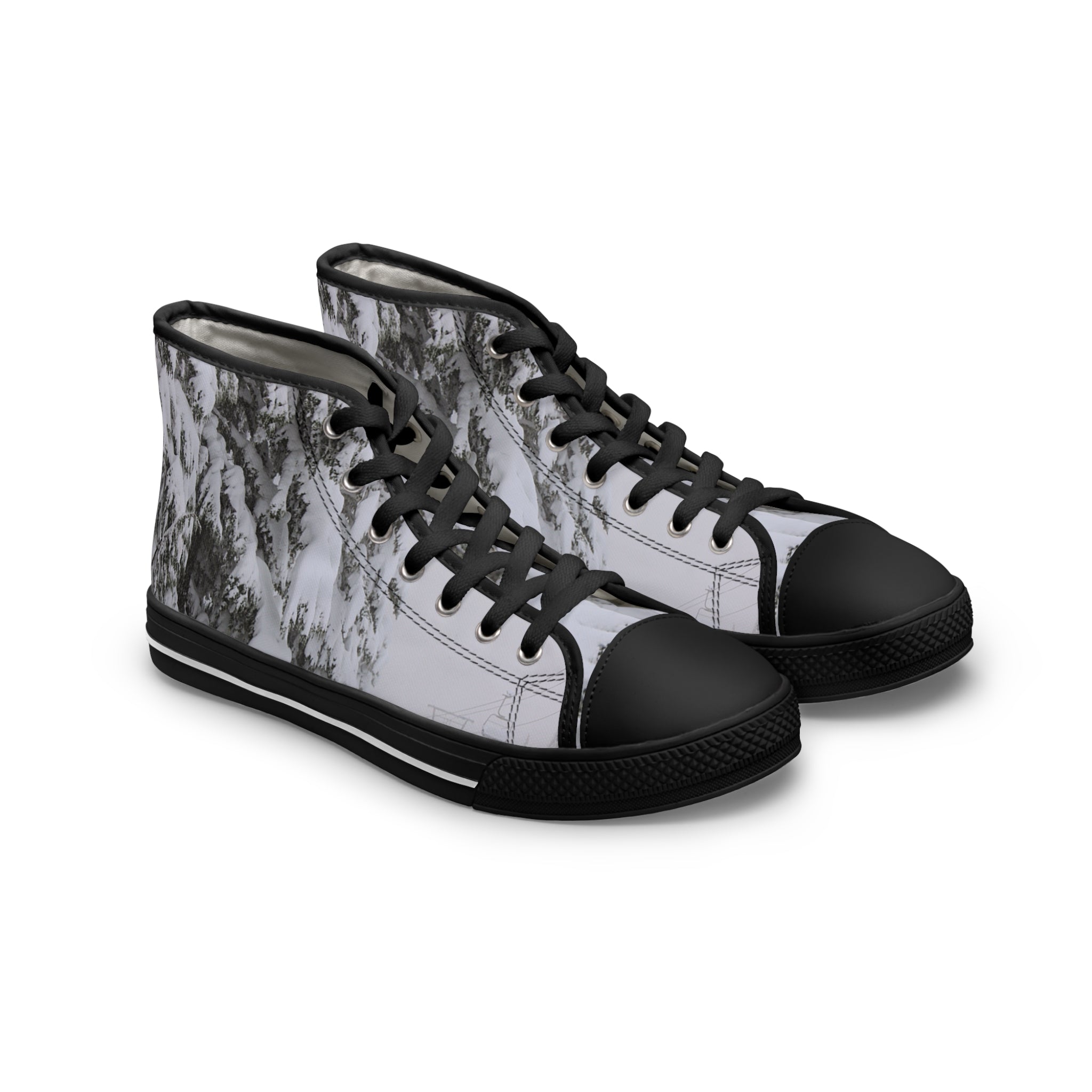 High-top sneakers with a black toe cap and white snow-covered branch pattern.