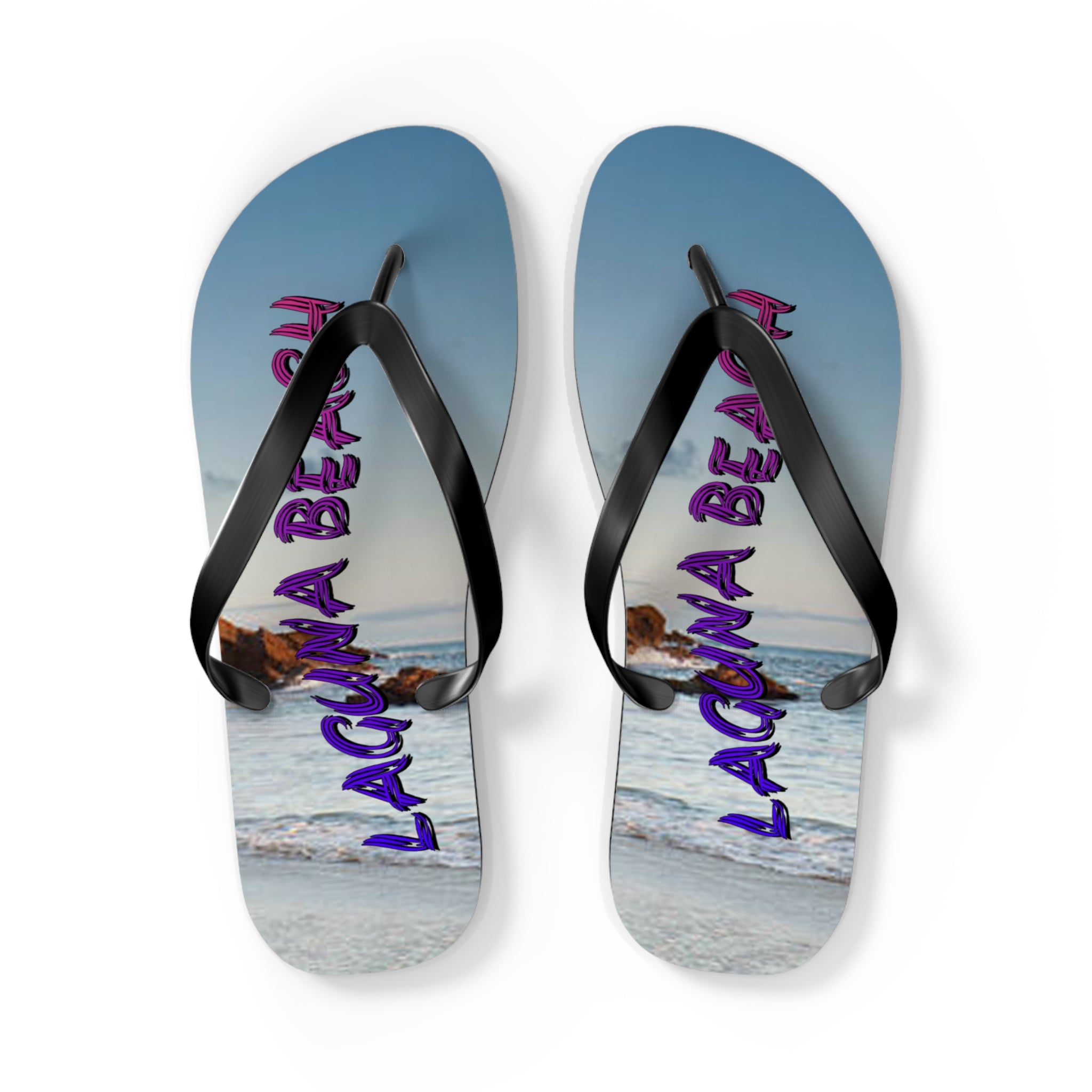 Laguna Beach flip-flops with ocean and rock background.