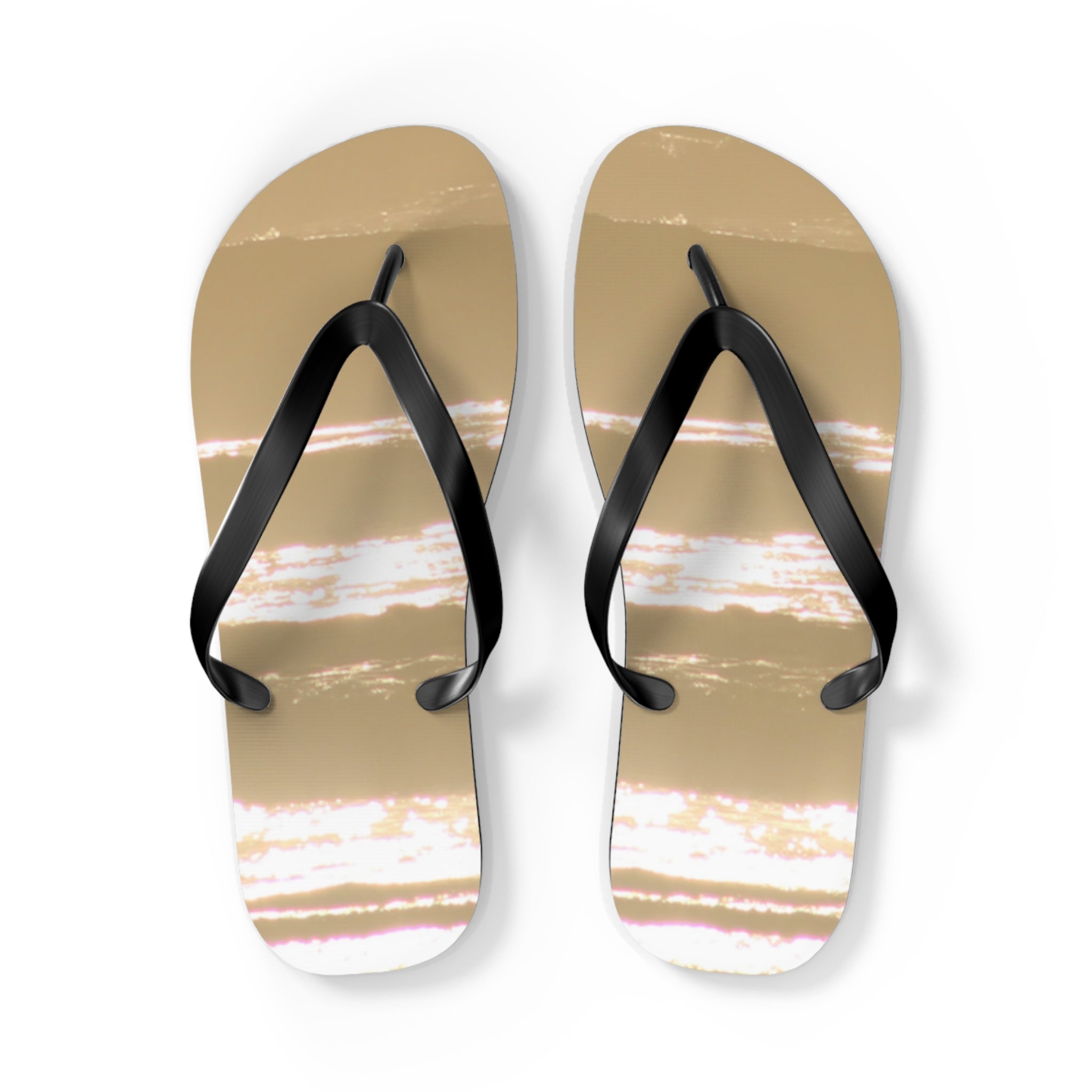 Tan flip-flops with black straps, featuring a sunset sky design.
